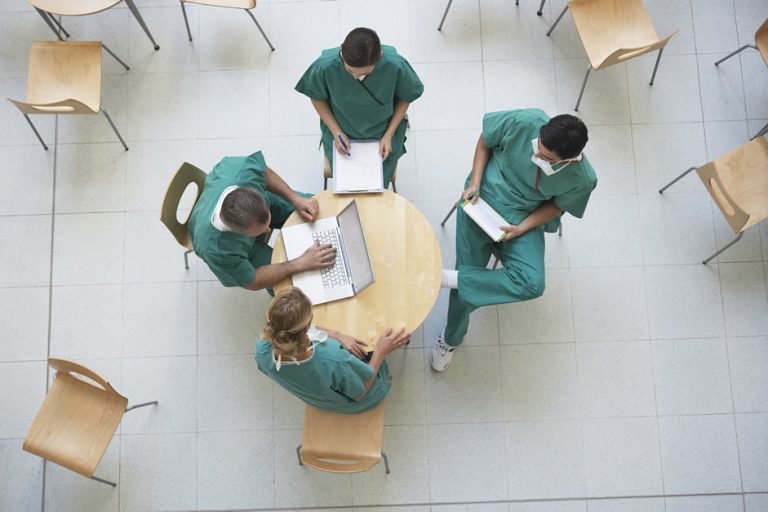 Clinicians around a table